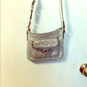 Cross body coach satchel